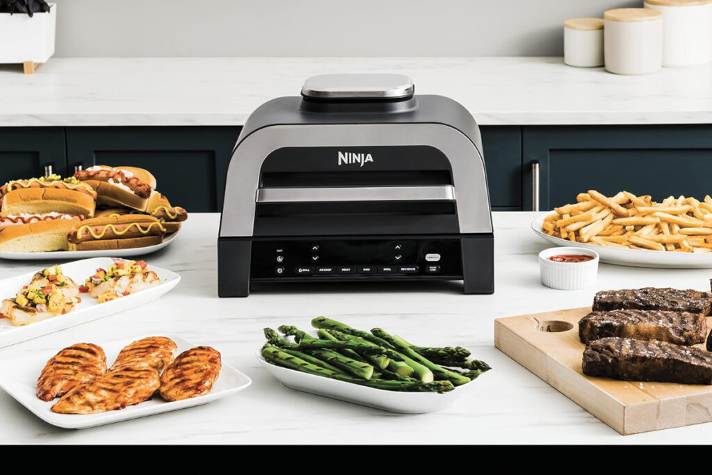 High-quality image of the Ninja DG551 Foodi Smart XL Indoor Grill showcasing its sleek design and multiple cooking features, ideal for grilling, air frying, and more in any kitchen.